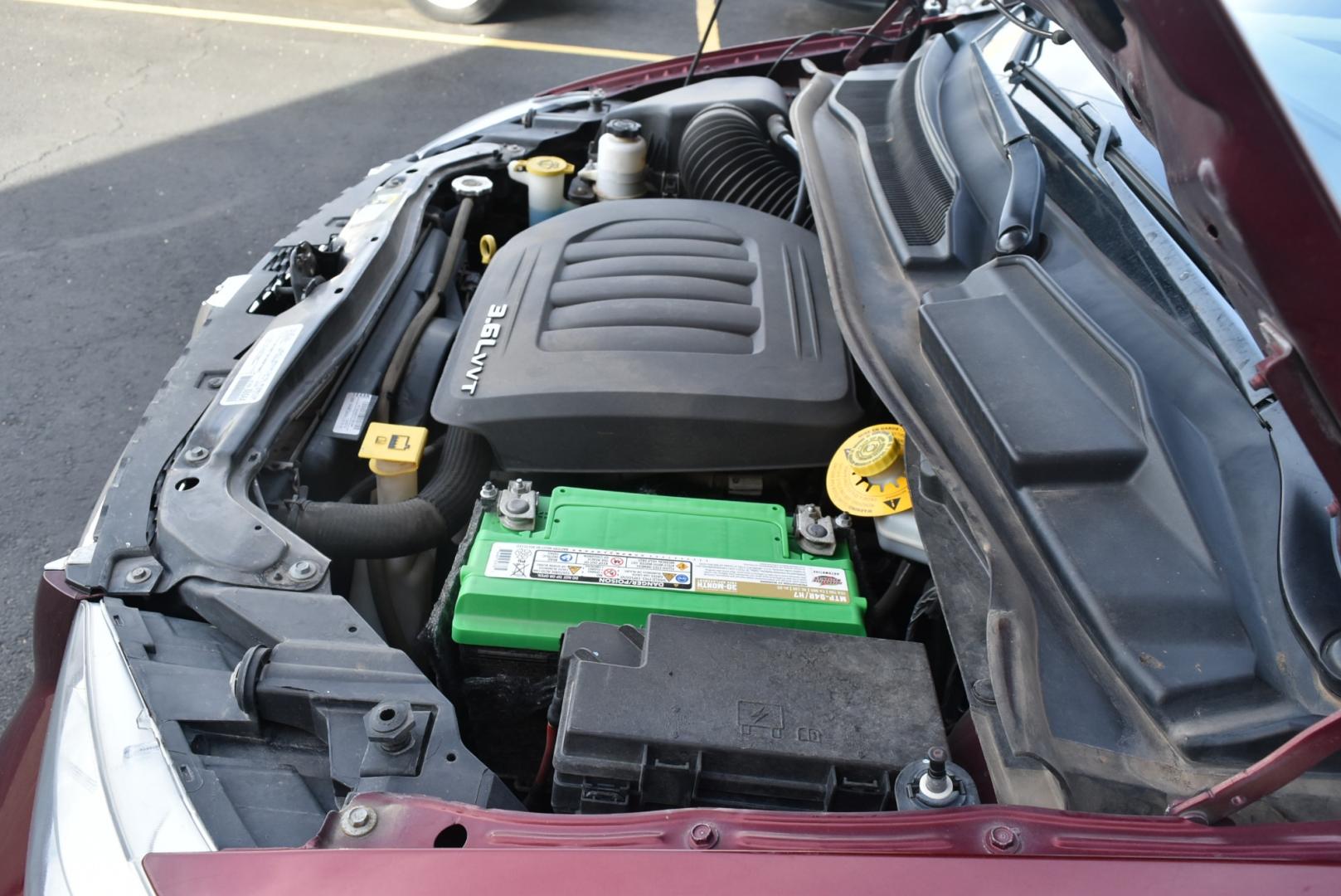 2017 Maroon /Black Dodge Grand Caravan SXT (2C4RDGCGXHR) with an 3.6L V-6 VVT 24 Valve Flex Fuel engine, 6-Speed Automatic transmission, located at 1600 E Hwy 44, Rapid City, SD, 57703, (605) 716-7878, 44.070232, -103.171410 - Photo#30